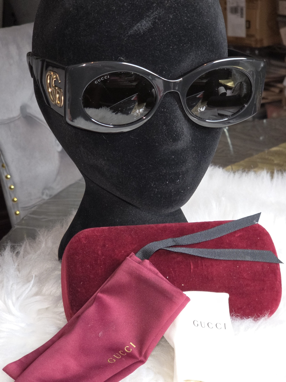 Gucci Black Oval Frame Sunglasses with Gold Logo